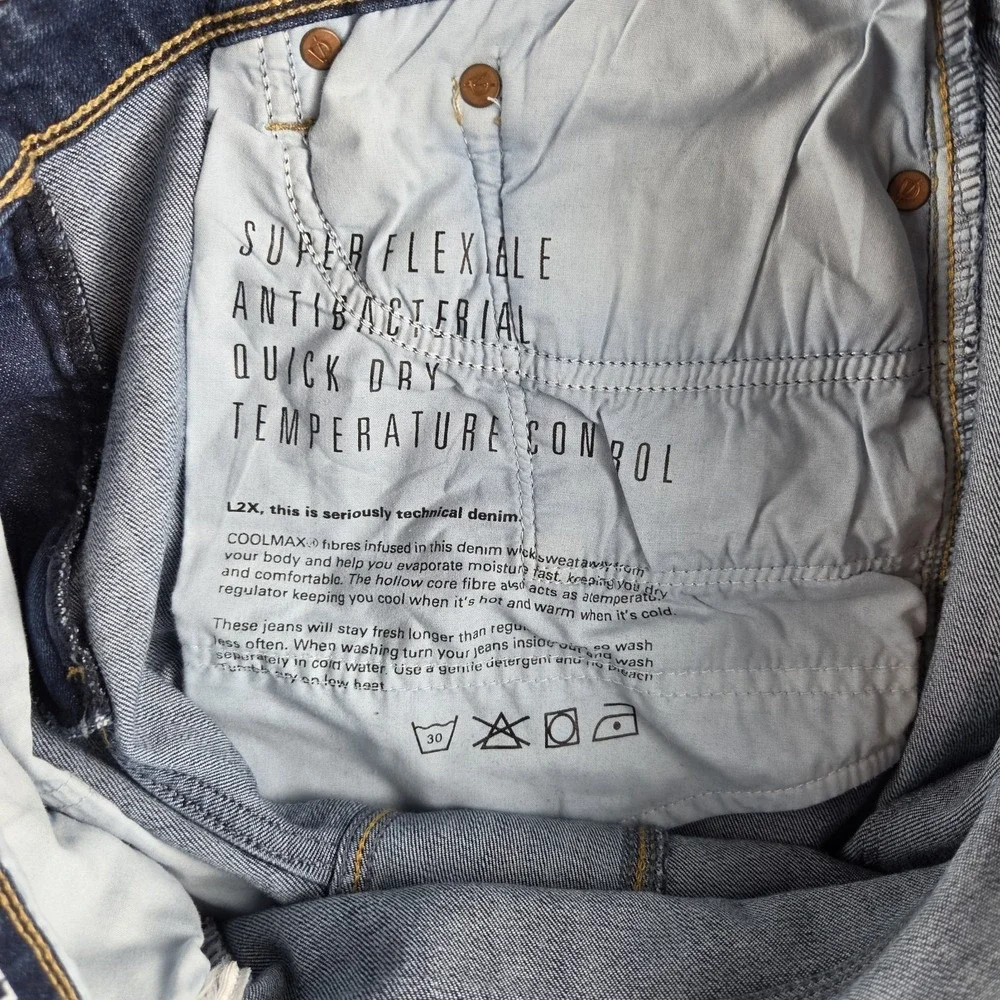 DUER L2X Relaxed Taper Jeans Med Wash Denim Cotton Blend 5-Pocket Mens 33X31